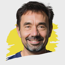 A friendly, professional headshot of Andrew from MindSpark.